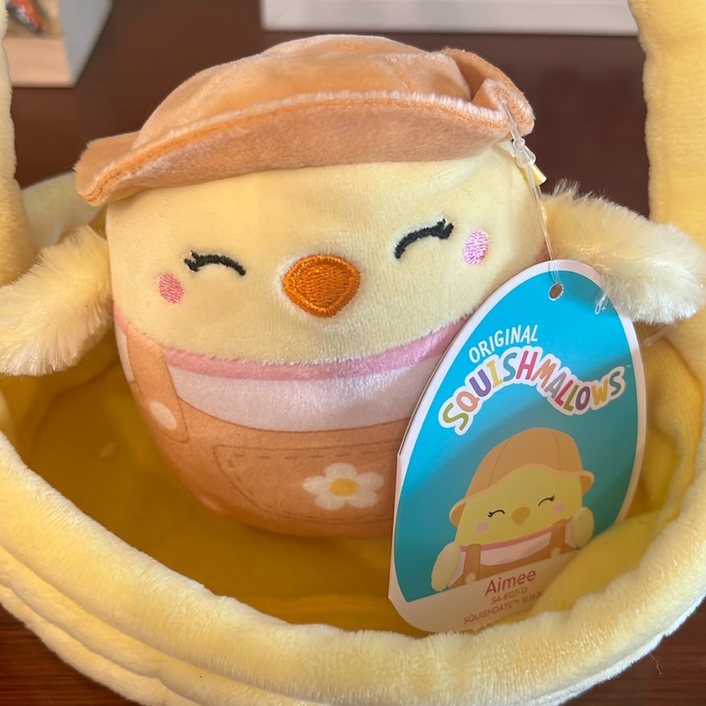 Chick squishmallow in plush basket